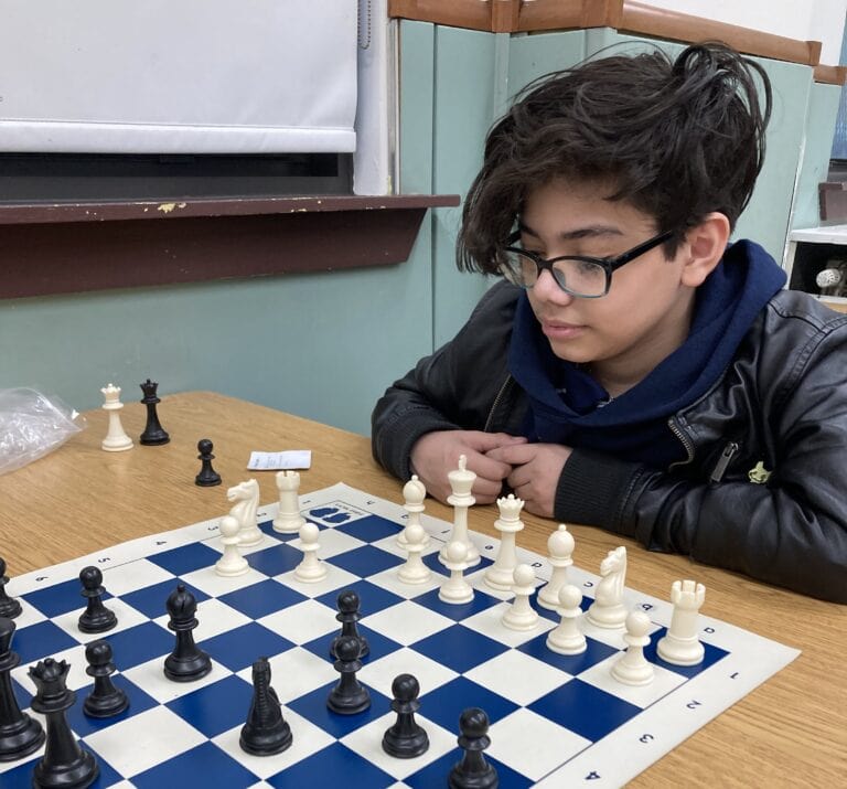 Student plays chess