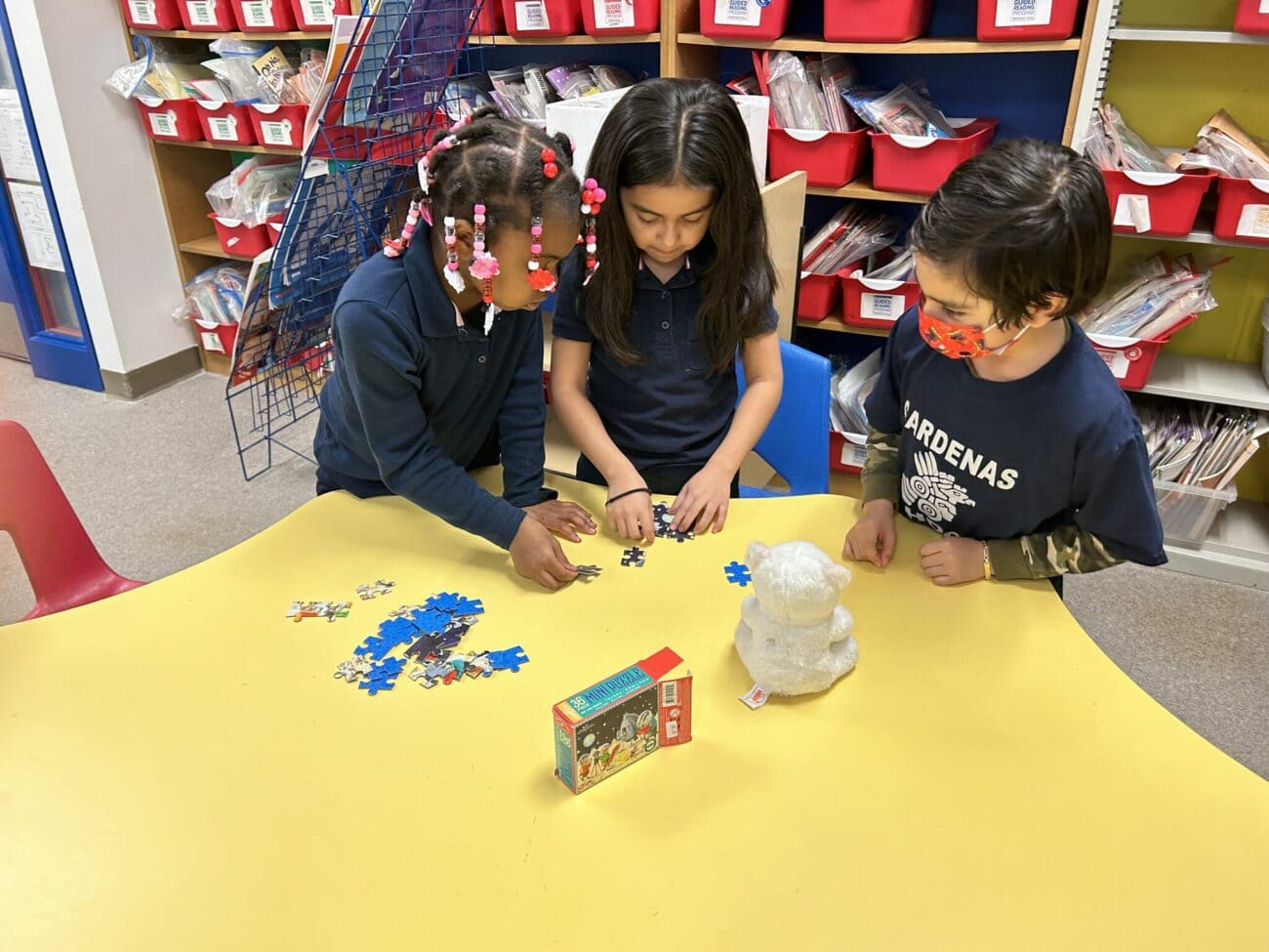 Students complete a puzzle together