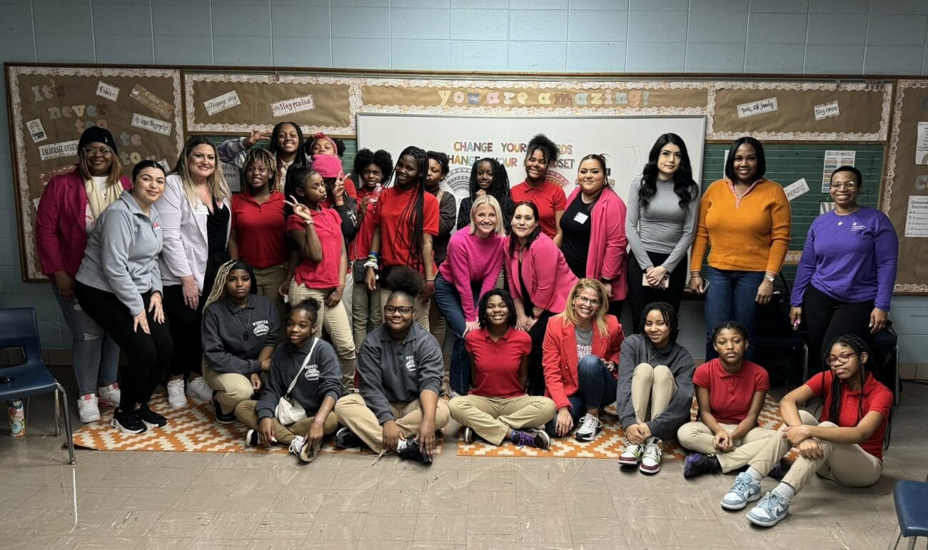 Students and Ulta team members smile