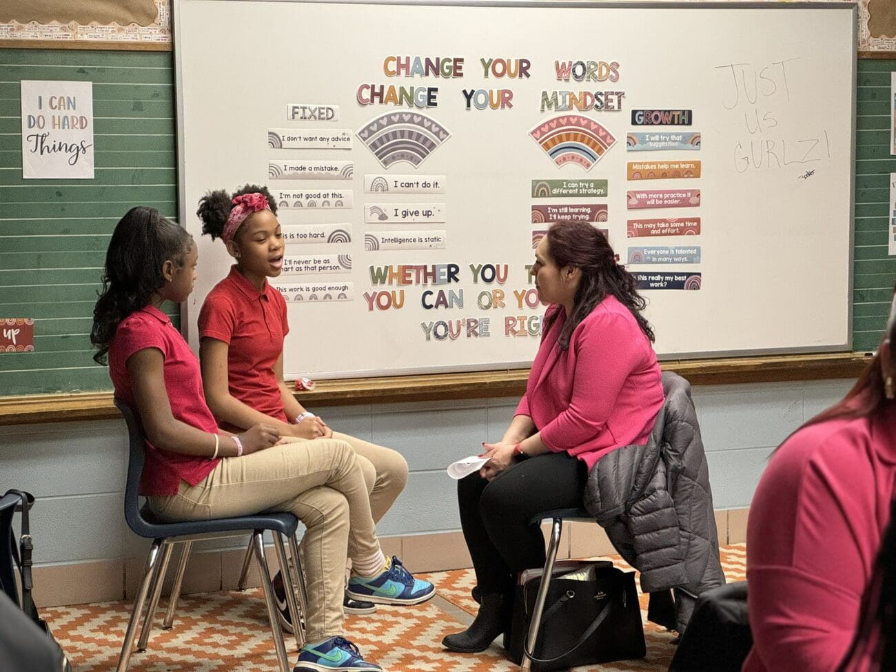 Students talk with mentor