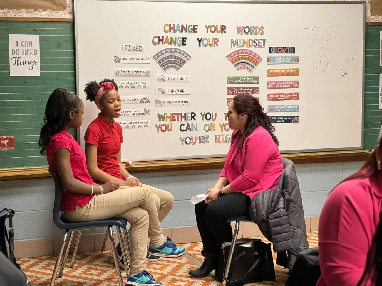 Students talk with mentor