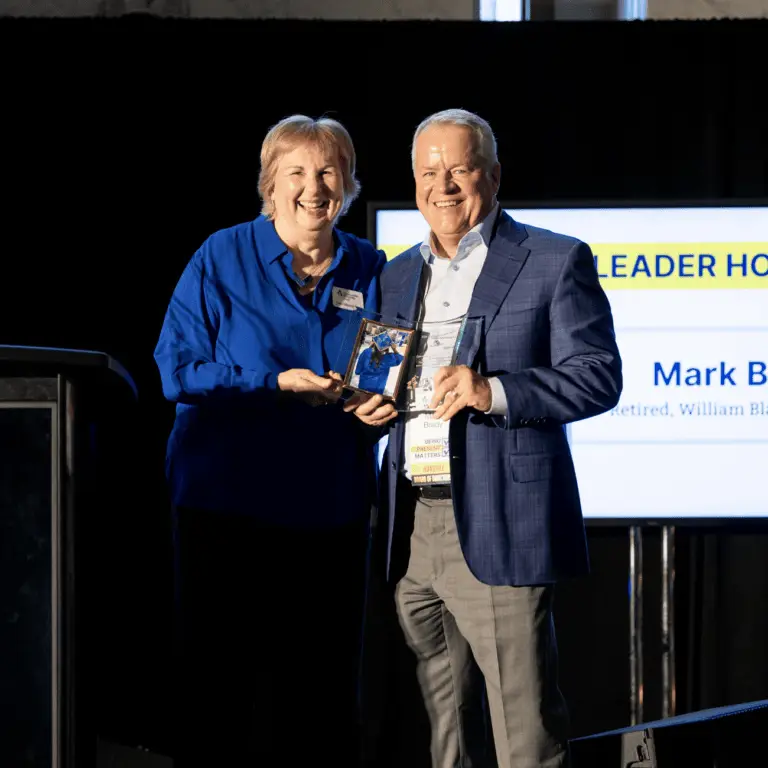 Mark accepts Inspiring Leader award